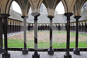 Black columns near the garden of the abbey of Mont-Saint-Michel in France