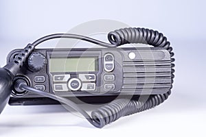 Black compact professional portable radio set.