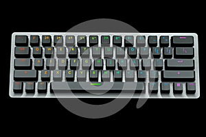 Black computer keyboard with rgb colors isolated on black background.