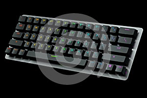 Black computer keyboard with rgb colors isolated on black background.