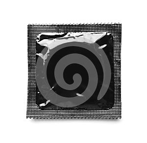 Black condom package on white background, top view. Safe sex