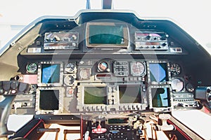 Black control panel in a helicopter cockpit.