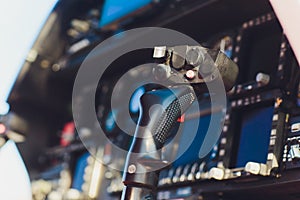 Black control panel in a helicopter cockpit.