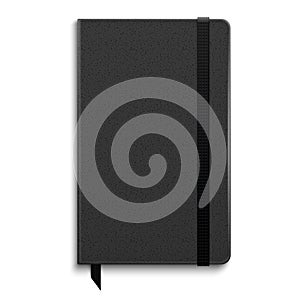 Black copybook with elastic band. photo