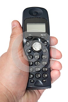 Black cordless phone in the hand on the white background