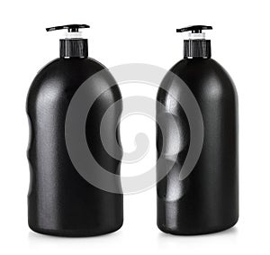 Black cosmetic bottle with pump isolated on white background