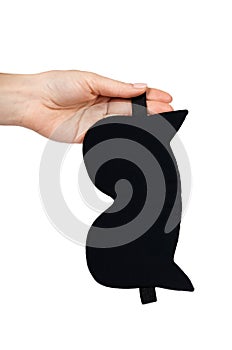Black cotton mask for sleep in hand. Isolated on white background. Cat shape