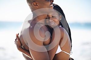 Black couple on beach, relax and hug on holiday with waves, sunshine and tropical island travel. Sea, happy man and