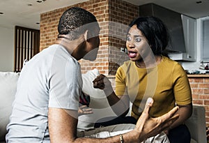 Black couple fighting and depressed photo
