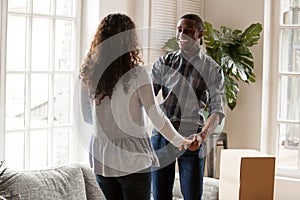 Black couple in love celebrate moving at new home