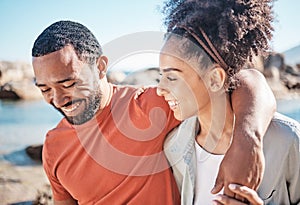 Black couple, love and happiness by the beach while having funny conversation or talking about love, care and commitment