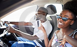 Black couple, road trip or freedom in car travel on summer love holiday adventure or location vacation. Smile, happy and