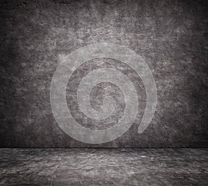 Black cracked concrete wall texture with sidewalk