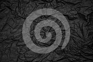 Black crampled paper