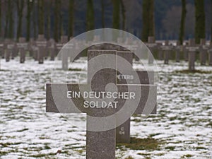 Black cross on grave on the cemetery of Ysselstein for an german unknown soldier in the Netherlands