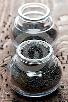 Black cumin in a glass photo
