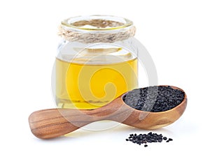 Black cumin oil with seeds photo