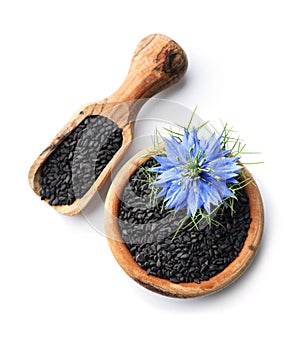 Black cumin seeds with nigella sativa flower