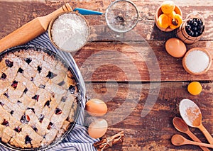 Black currant and apricot pie with ingredients