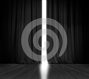 Black curtain background with bright light behind