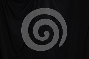 Black Curtain drape wave with studio lighting