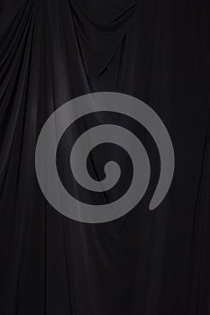 Black Curtain drape wave with studio lighting