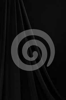 Black Curtain drape wave with studio lighting