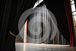 Black curtain stage background slightly open