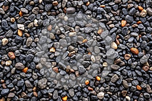 Black or dark gray rough grainy stone or sand texture background photo