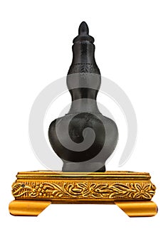 Black decanter on gold platform