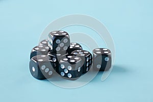 Black Dice on a blue color background