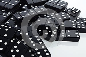 black dice on a white background, close up shot, top view, Black dominoes on a white background, AI Generated