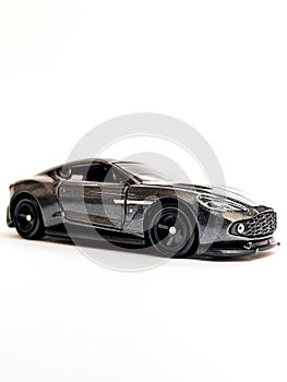 black diecast car on white background