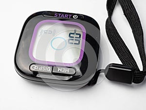 a black digital pedometer, a device for counting steps