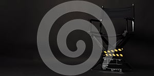 Black director chair and Clapper board or movie Clapperboard on black background.use in video production or film cinema industry