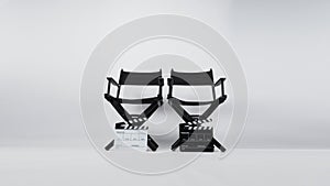 Black Director chair and clapper board.It is use in video production or movie and cinema industry on white background