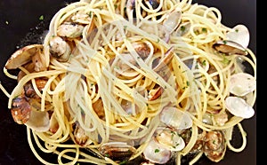 Spaghetti with clams on dish