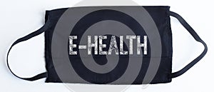 Black disposable protective mask with E HEALTH text on black background