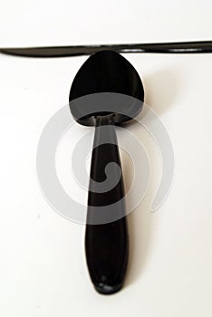 Black disposable spoon and knife