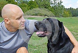 Black dog with boy