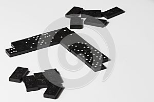 Black dominoes isolated on a white background.Copy space