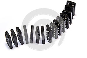 Black dominos in chain on white background