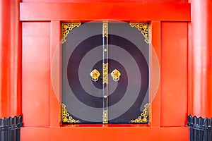 Black door with orange red japanese style in sensoji temple Asakusa, Tokyo, Japan