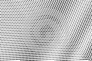 Black dots on white background. Grunge perforated surface. Sparse halftone vector texture. Diagonal dotwork gradient