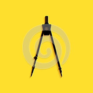 Black Drawing compass icon isolated on yellow background. Compasses sign. Drawing and educational tools. Geometric