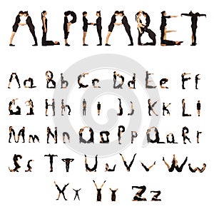 Black dressed people forming Alphabet People