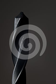 Black Drill Bit on dark background