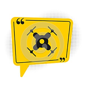 Black Drone flying icon isolated on white background. Quadrocopter with video and photo camera symbol. Yellow speech