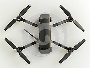 A black drone with propellers on top of a white surface photo