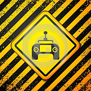 Black Drone radio remote control transmitter icon isolated on yellow background. Warning sign. Vector